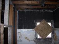 Smoke damage on lath and plaster.
